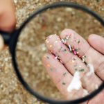 Microplastic particles magnified. Plastic pollution is everywhere.