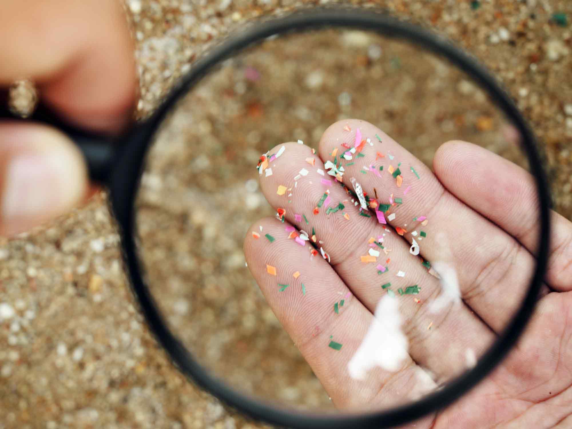 Microplastic particles magnified. Plastic pollution is everywhere.