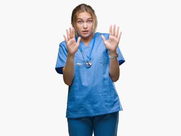 Hospital worker backing up. Workplace Violence.